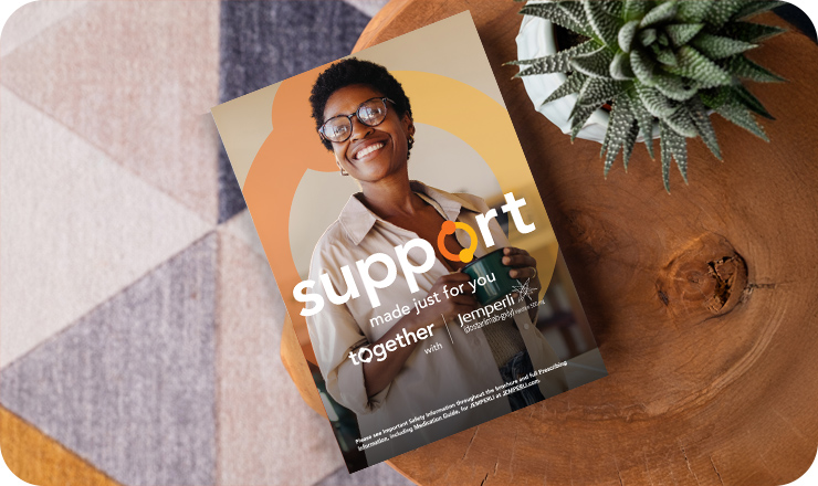 Together With brochure on a table next to a plant